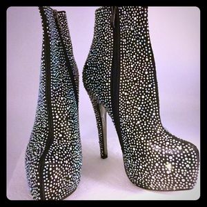 Black rhinestone covered high platform bootie.